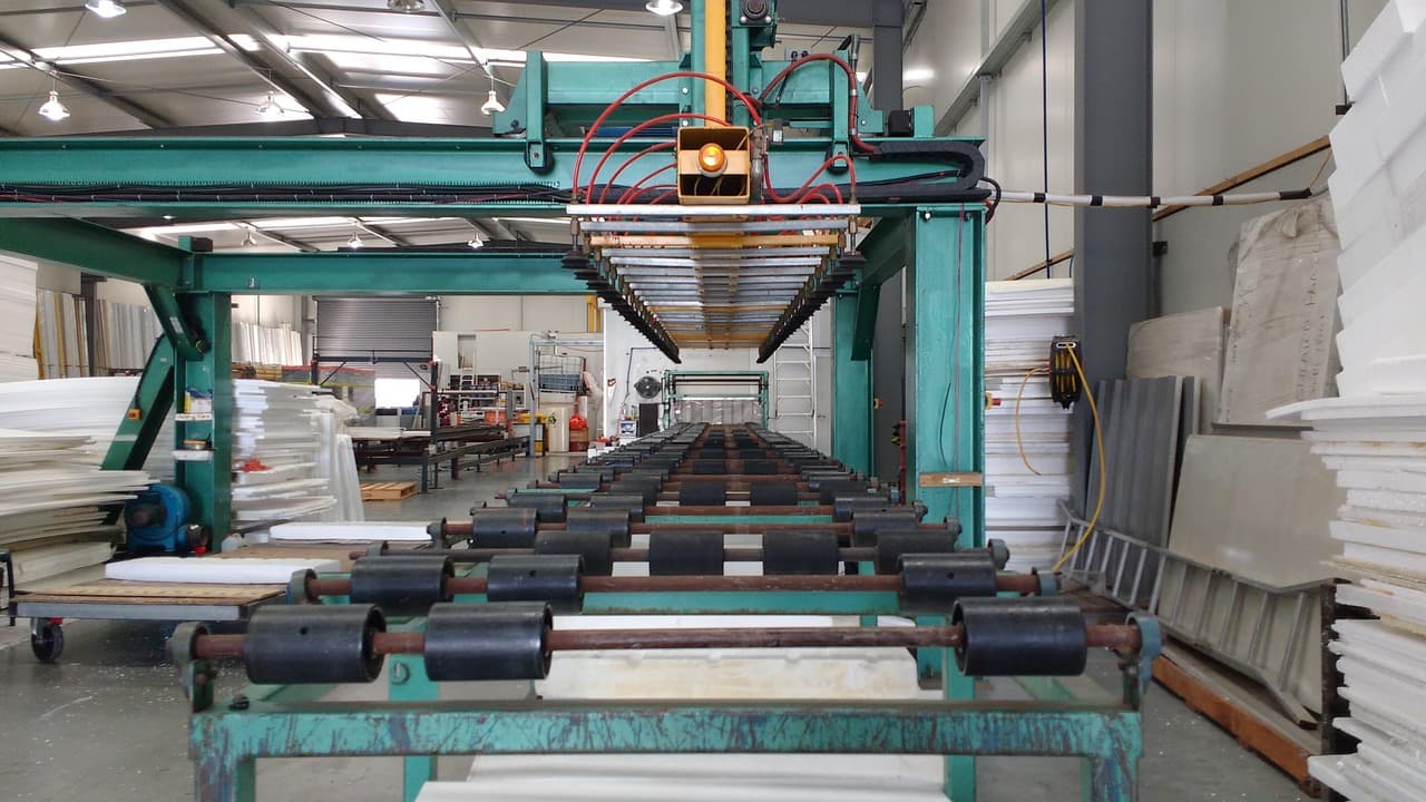 Real factory floor with industrial machines and production equipment